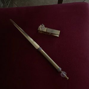 Letter opener and paper holder.